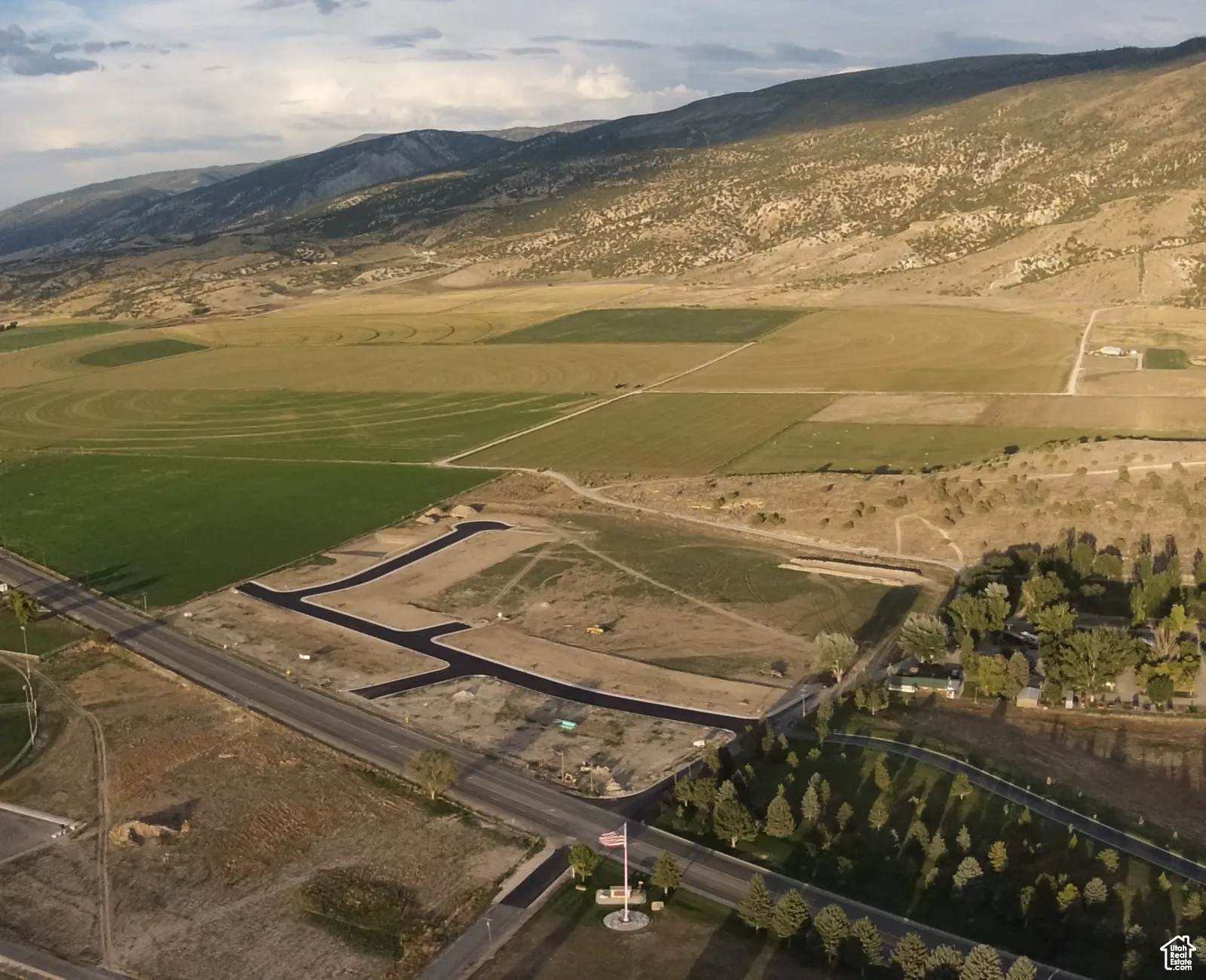 View of property location featuring mountains and rural landscape
