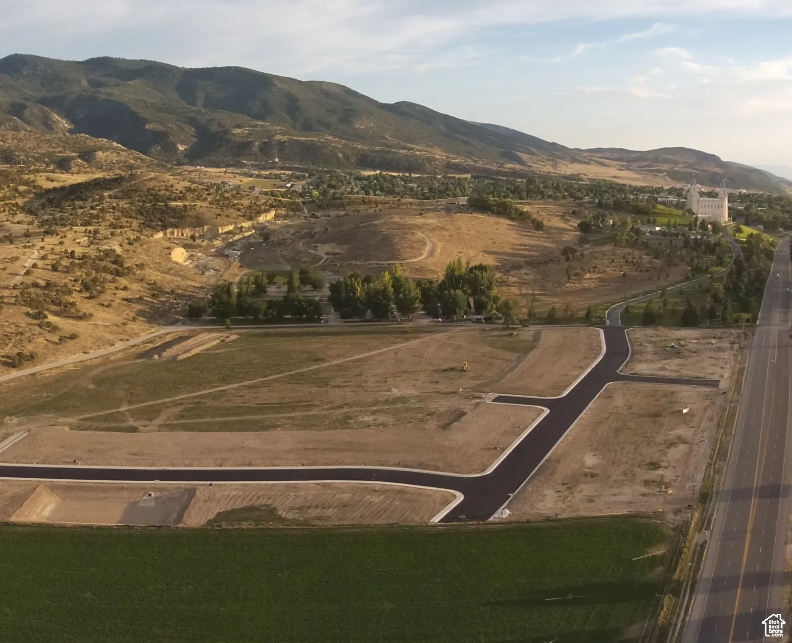 View of property location with mountains and rural landscape