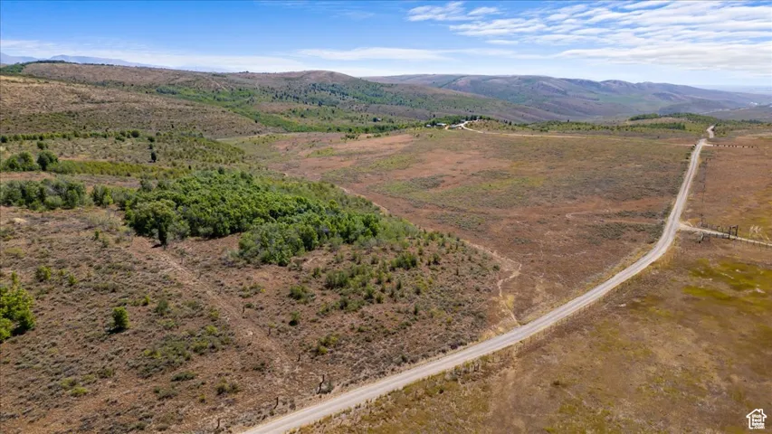 Aerial view of sparsely populated area with mountains