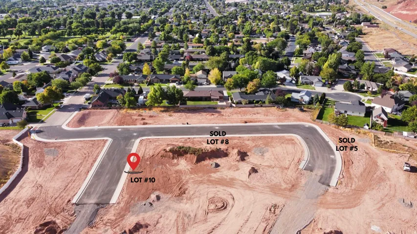 Aerial view of residential area with property parcel outlined