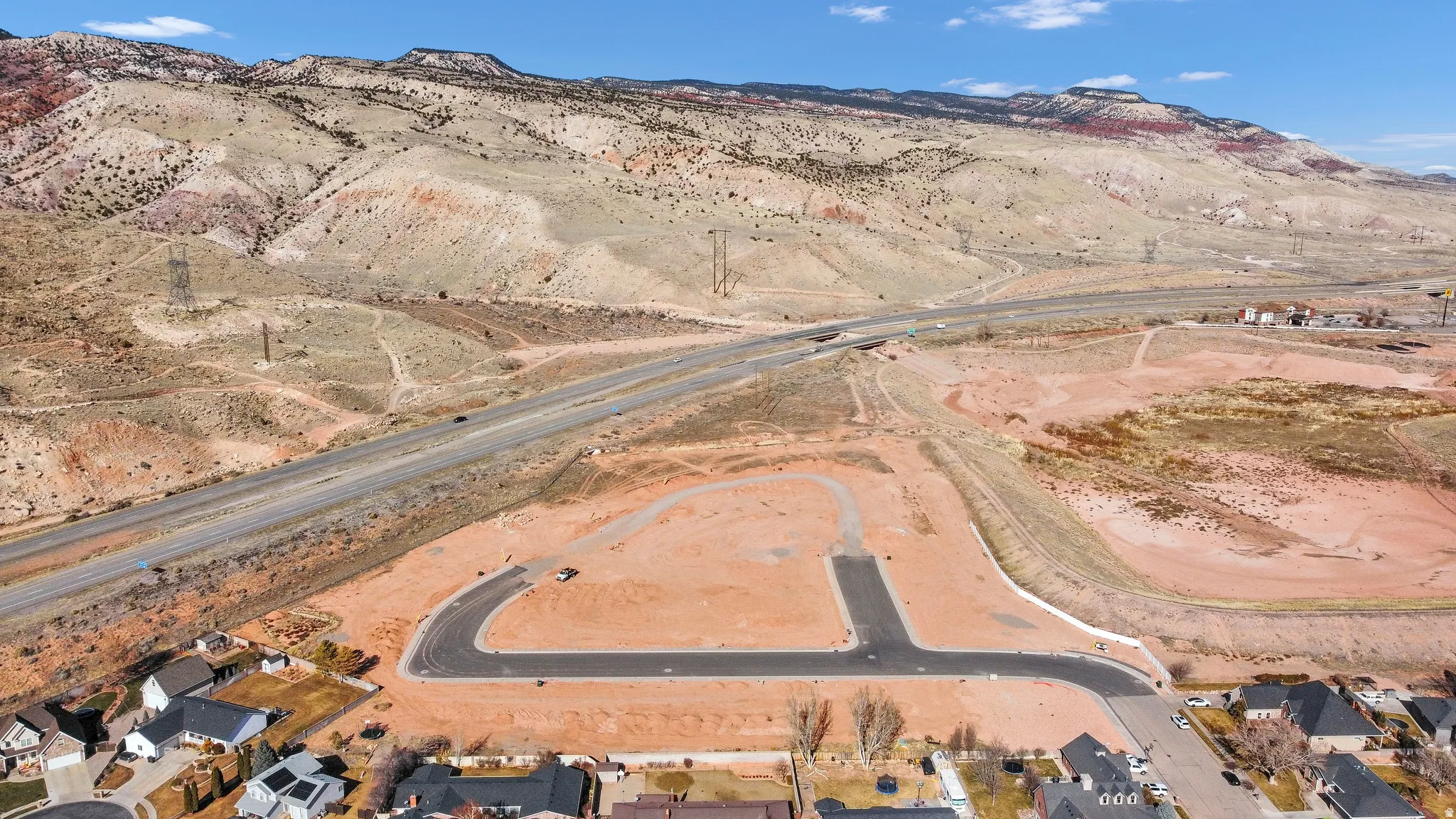 Aerial view of residential area with a mountain backdrop
