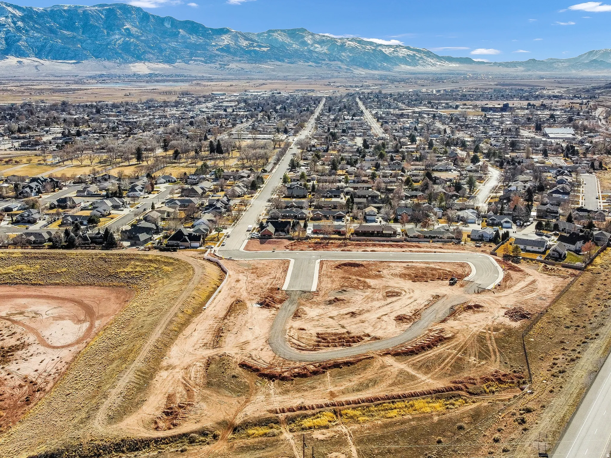 Aerial view of residential area with mountains
