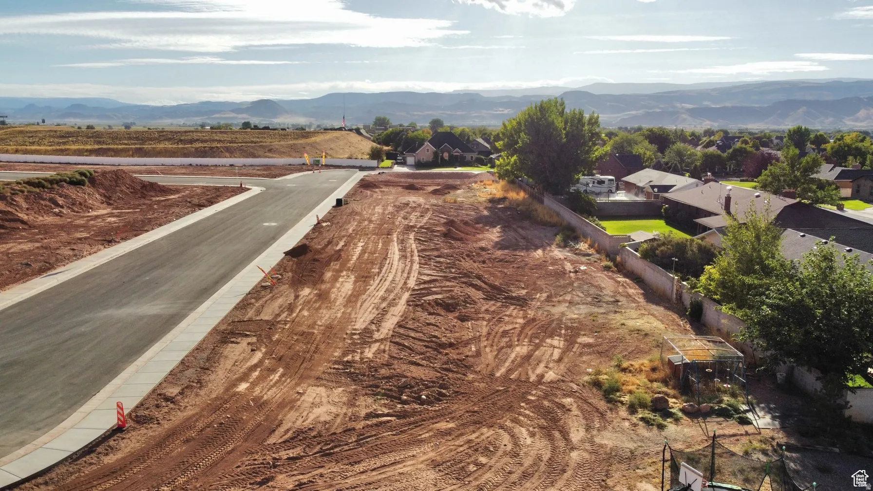 View of asphalt road featuring a mountain view