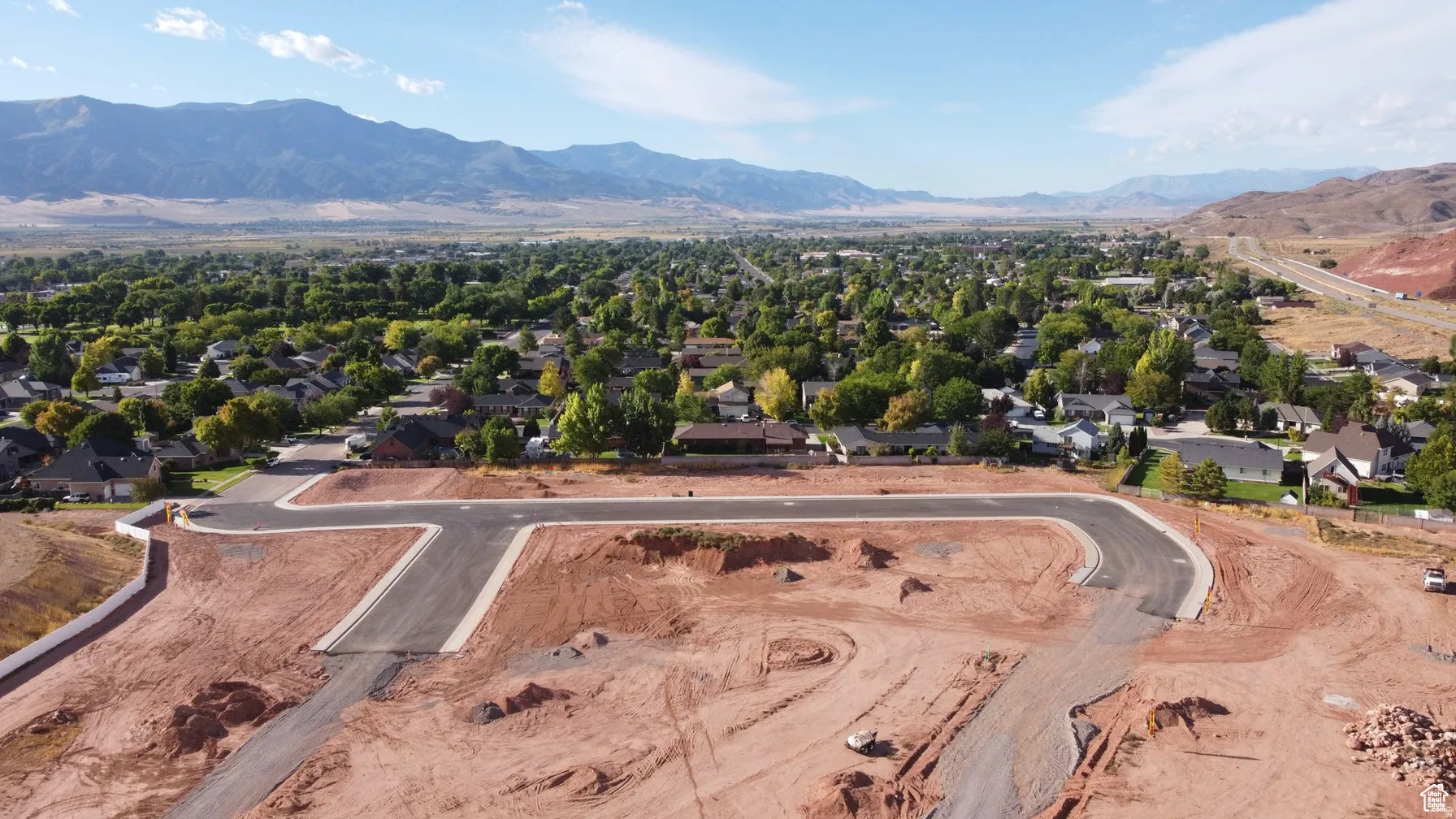 Aerial perspective of suburban area featuring mountains