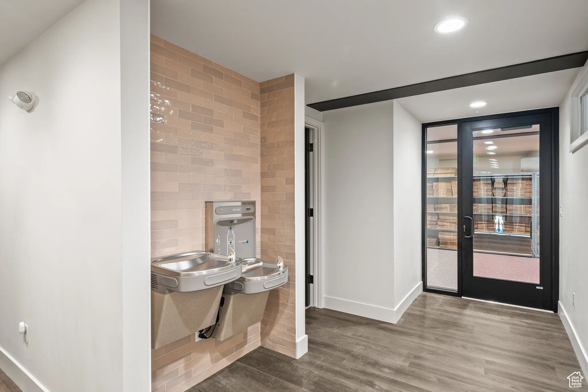 Bathroom with wood finished floors and recessed lighting