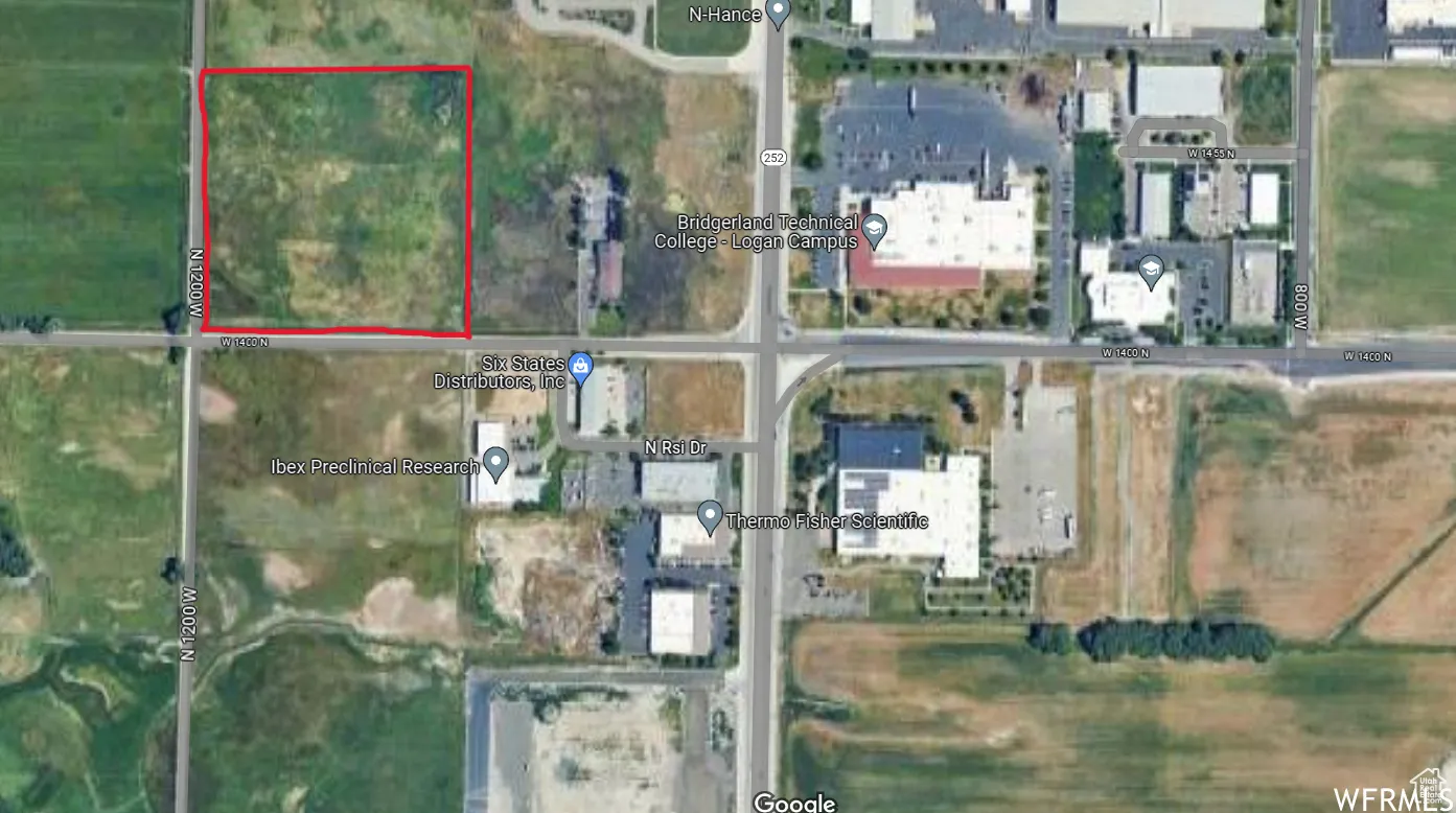 Aerial view of property's location with property parcel outlined