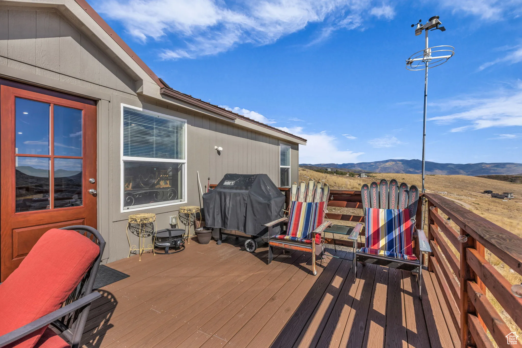 Open outdoor deck featuring a mountain view