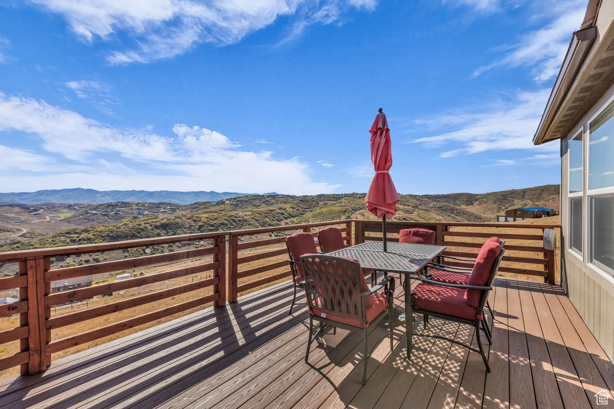 Open outdoor deck featuring a mountain view