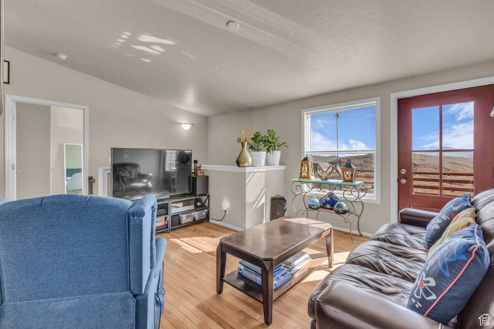 Living area with light wood-style flooring