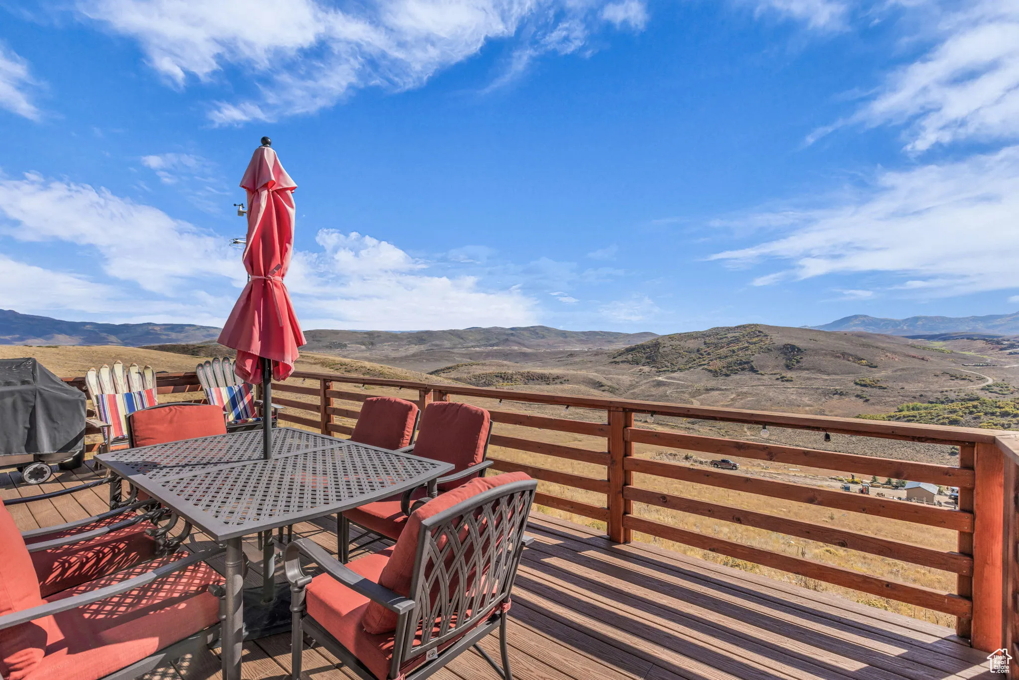 Open outdoor deck featuring a mountain view