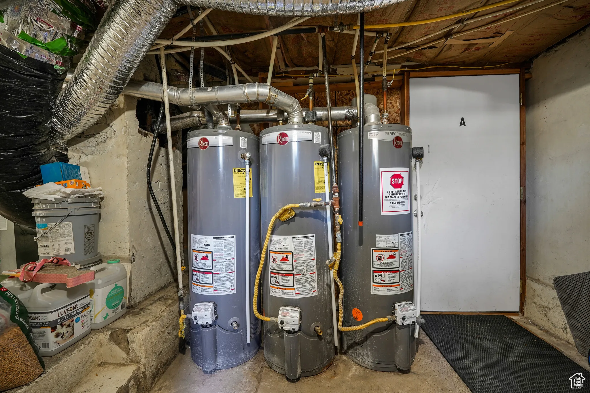Utility room with gas water heater