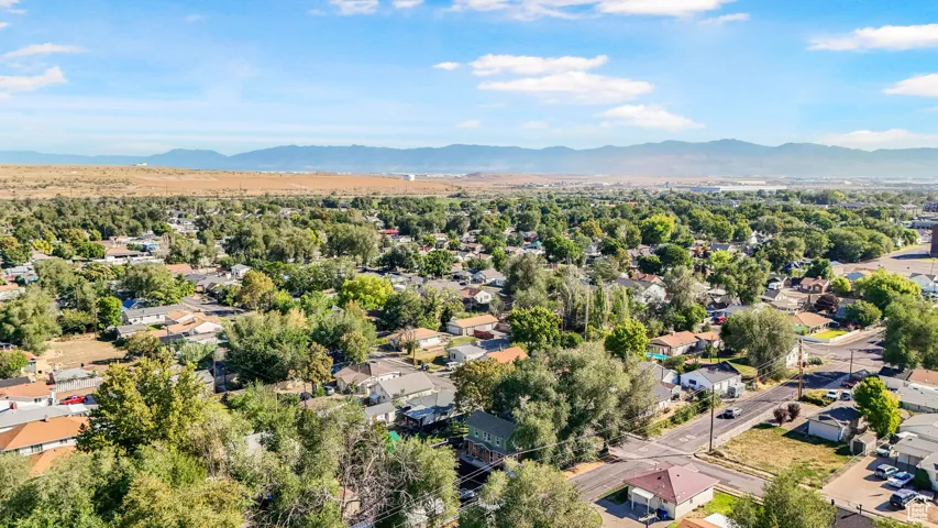 Aerial view of residential area with a mountainous background