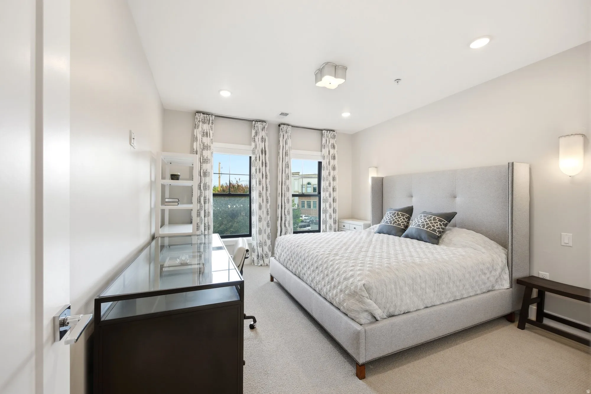 Bedroom featuring light colored carpet and recessed lighting