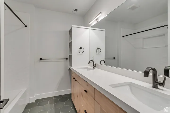 Basement baths are roomy and can accomodate single or dual sinks.