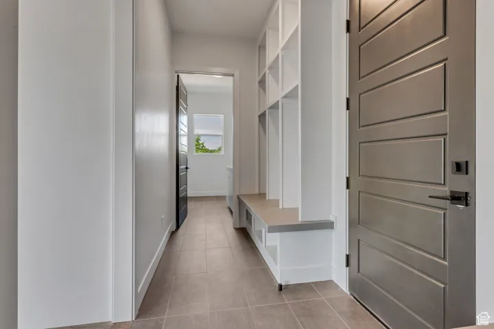 Mudroom with built in bench and storage.