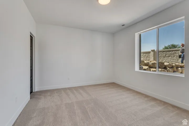 Basement bedrooms are roomy and have natural light.