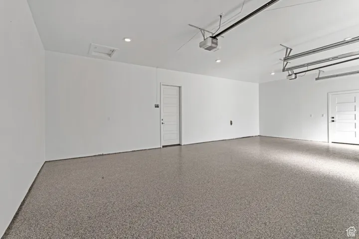 Fully finished and insulated garage with epoxy finish on floors included