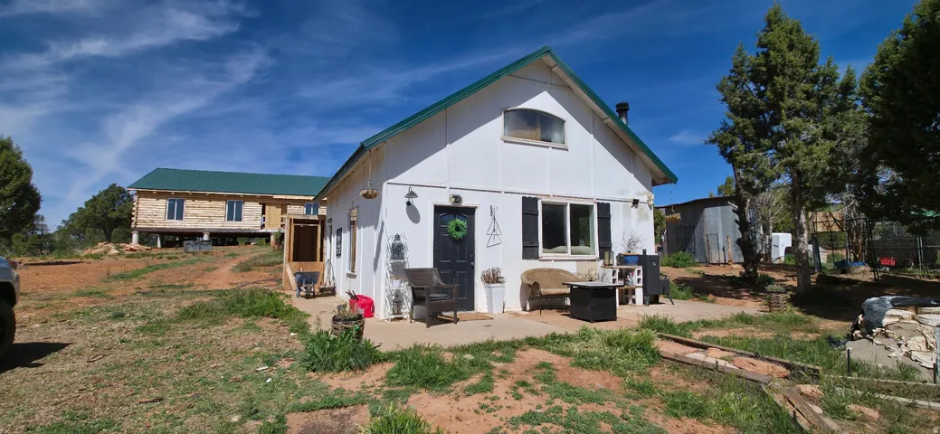 Rear view of house with a patio area