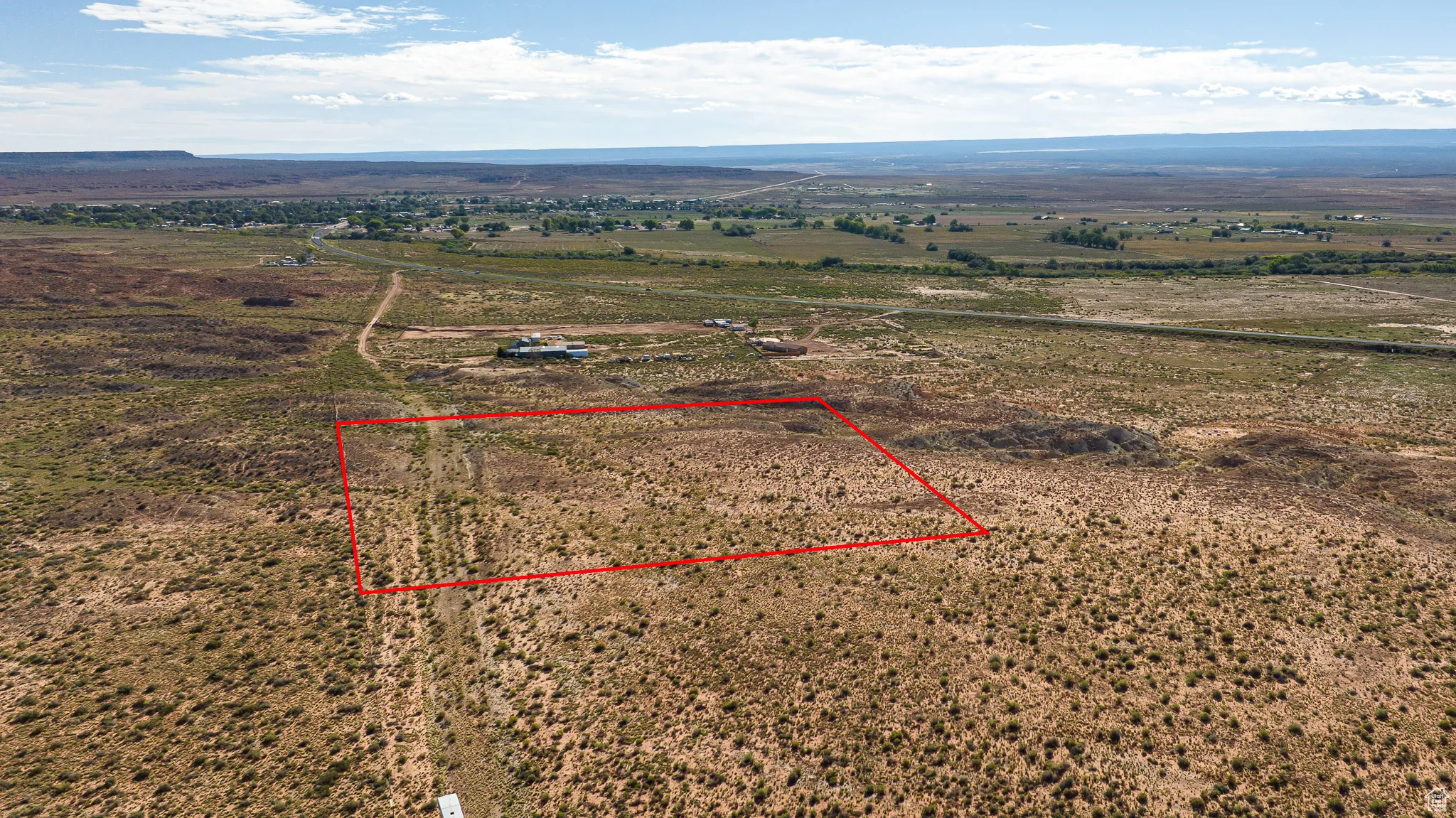 Overview of rural landscape with property parcel outlined