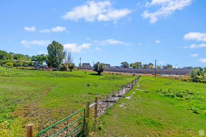 View of yard with a view of countryside