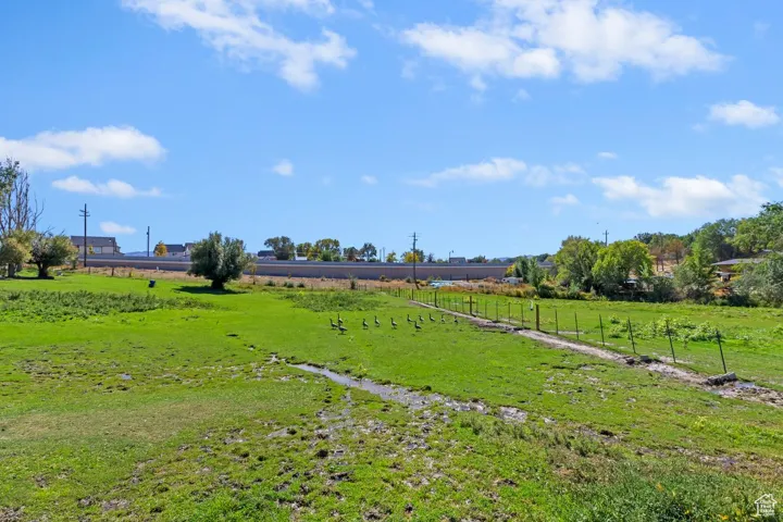 View of yard featuring a view of rural / pastoral area
