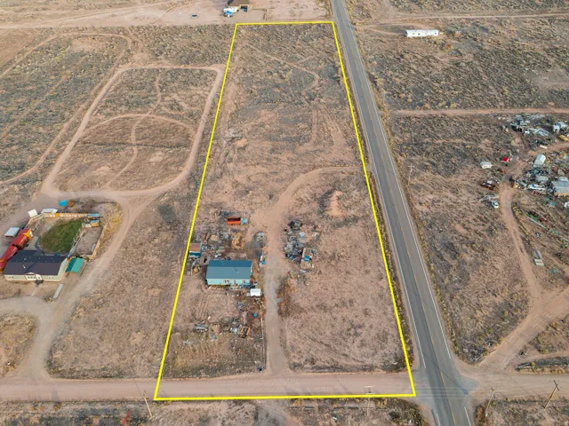Overview of rural landscape with property boundaries highlighted and a desert landscape