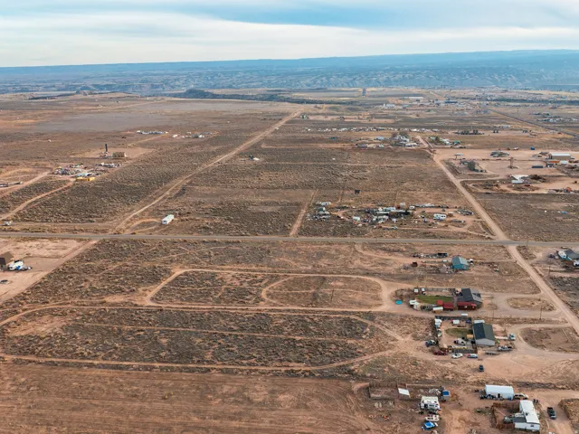 Aerial view of property's location featuring rural landscape and a desert landscape