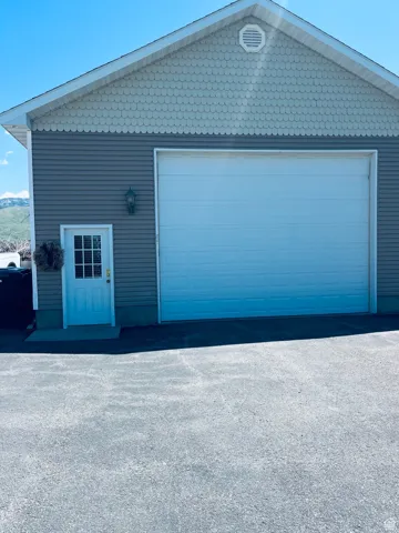 Front shop larger with storage and heated.