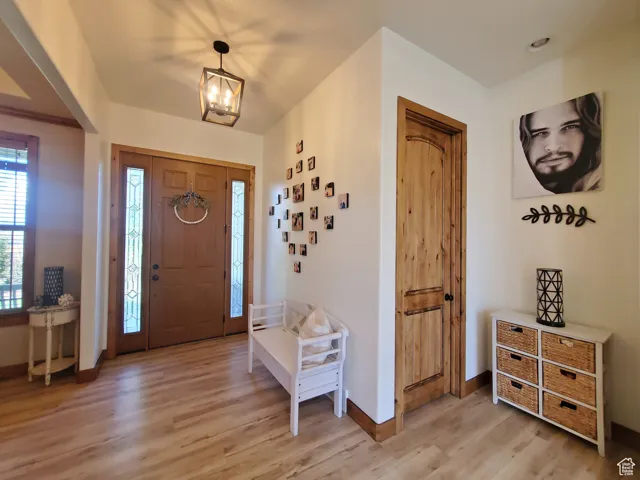 Foyer featuring light wood-type flooring