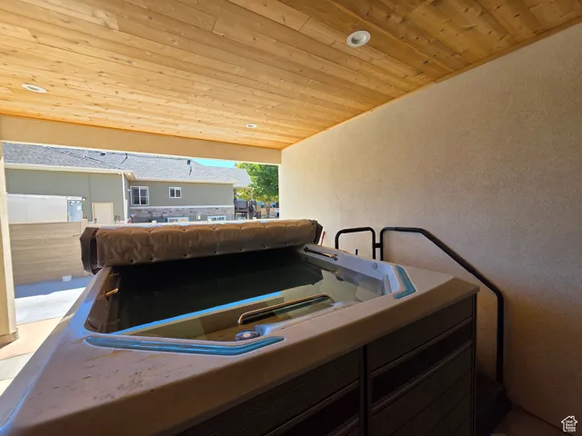 View of patio / terrace featuring a hot tub