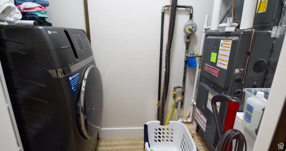 Washroom with washer / dryer and heating unit