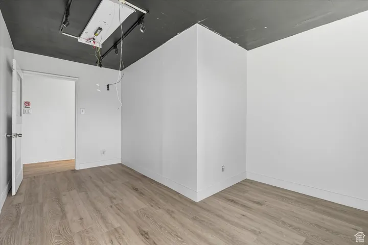 Rentable office with wood finished floors and baseboards