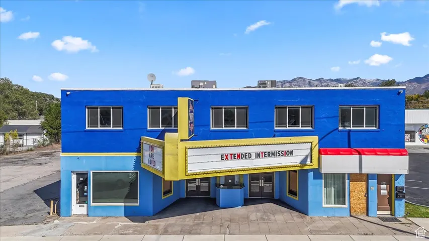 View of property with a mountain view