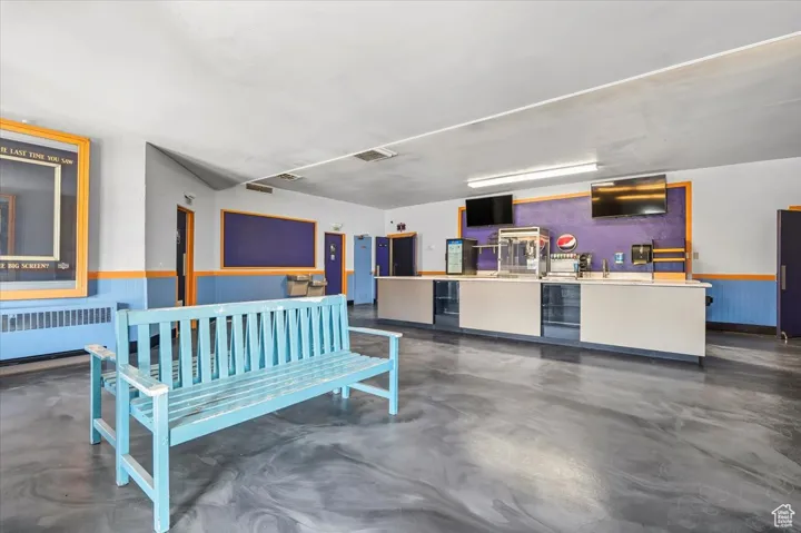 Welcome area with a wainscoted wall