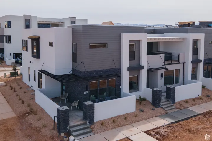 View of front of property featuring stucco siding