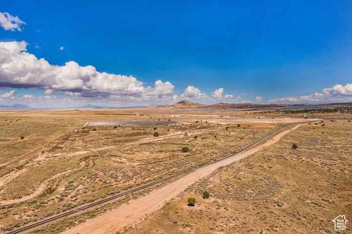 Overview of rural landscape with a desert landscape and a mountainous background