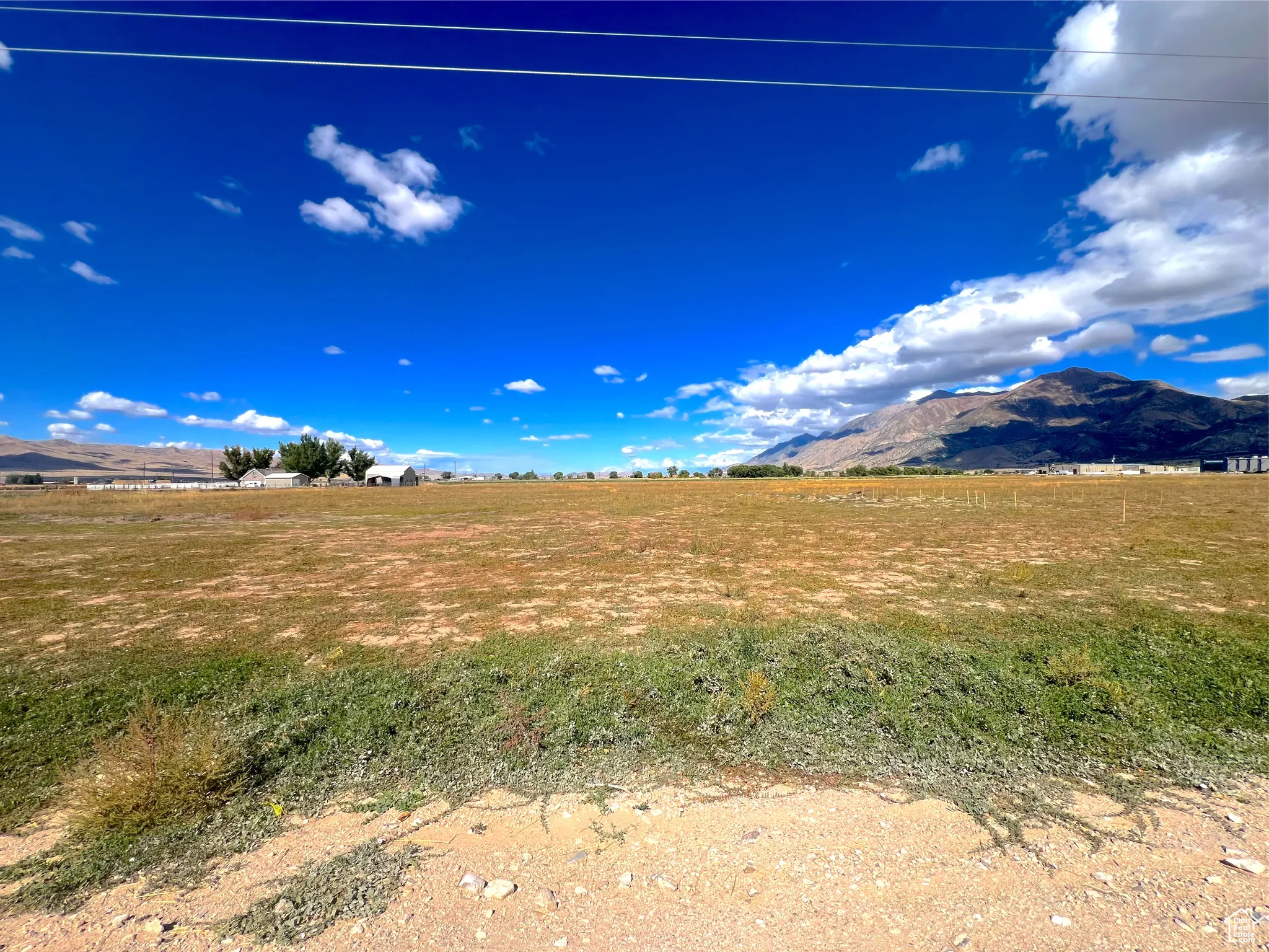 View of yard featuring a mountain view and a rural view