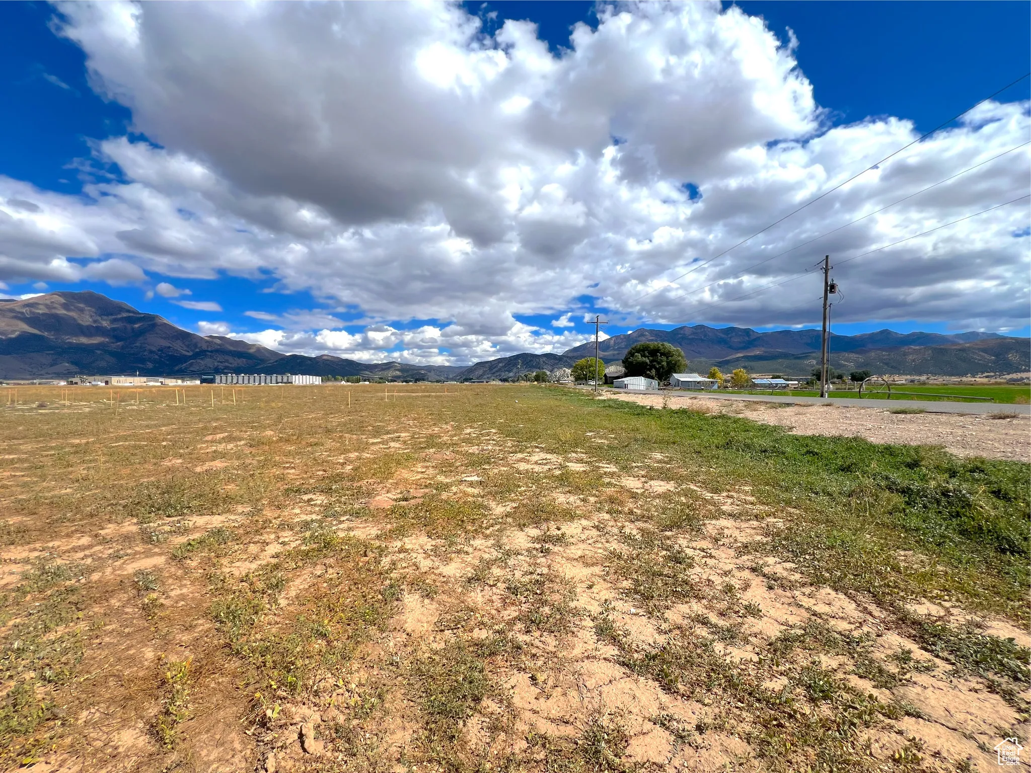 View of mountain background featuring rural landscape