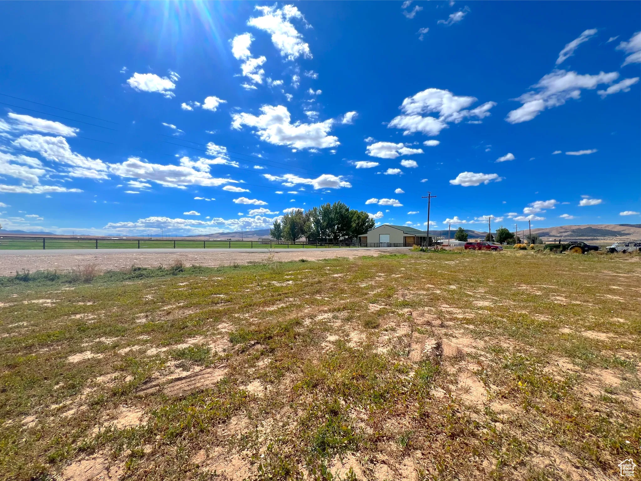 View of yard with a view of rural / pastoral area and a mountain view