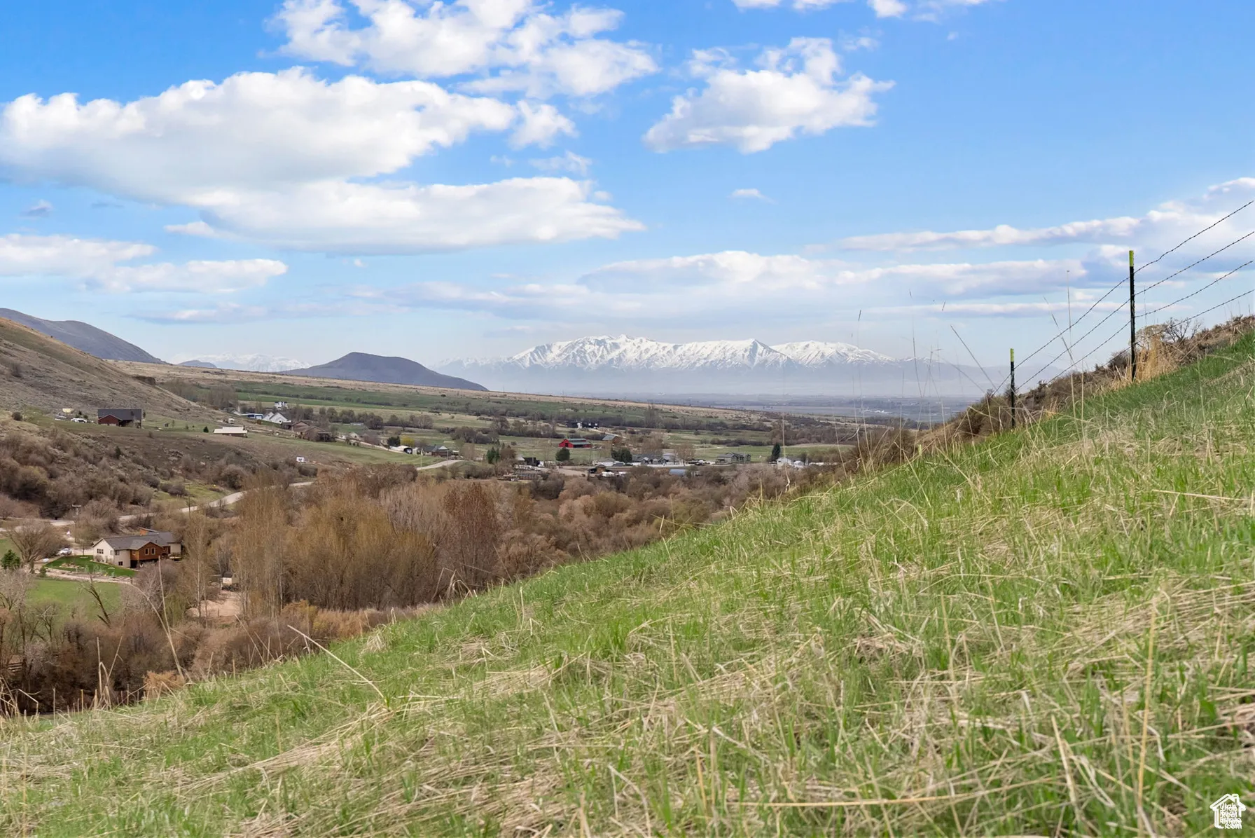 View of mountain backdrop featuring rural landscape