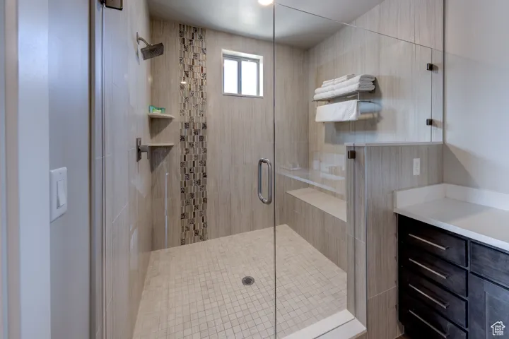 Full bath with a shower stall