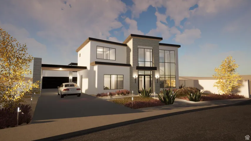 Modern home with driveway and stucco siding