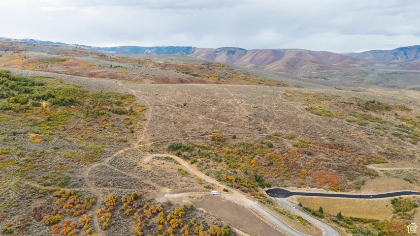 Aerial view of sparsely populated area with mountains