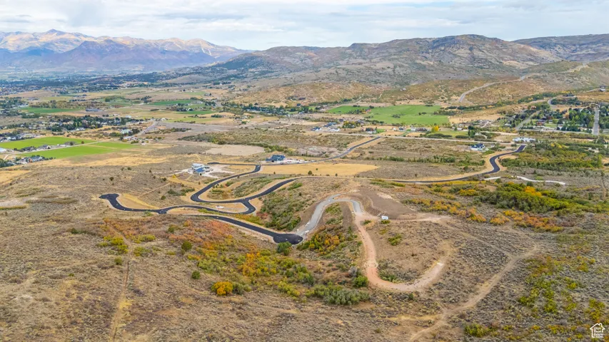 Aerial overview of property's location featuring mountains and rural landscape