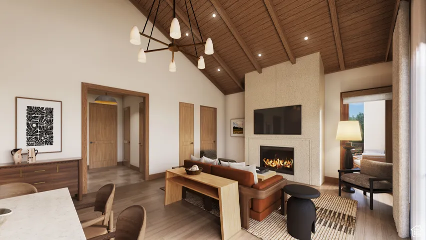 Living room with high vaulted ceiling, a wooden ceiling with exposed beams, wood finished floors, a fireplace, and recessed lighting