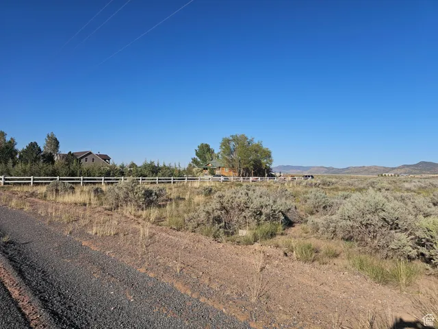 View of yard with a view of rural / pastoral area