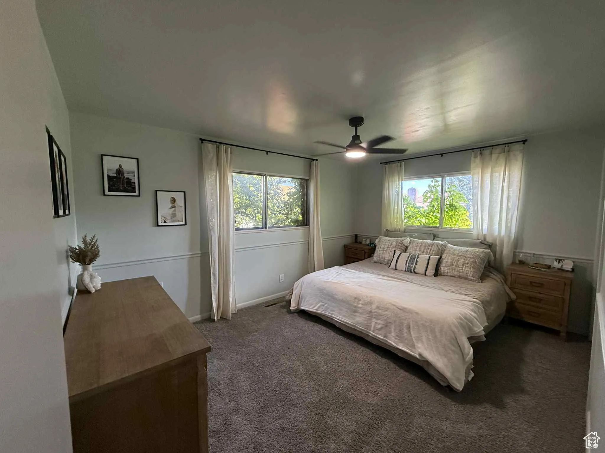 Master Bedroom with carpet flooring and a ceiling fan