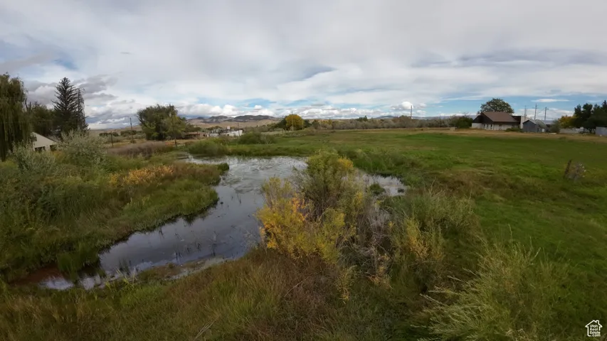 Water view with rural landscape