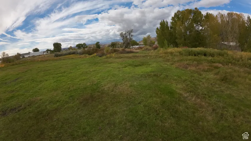 View of yard with a view of countryside