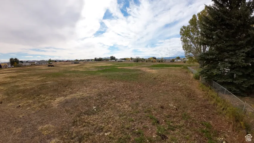 View of yard featuring a view of rural / pastoral area